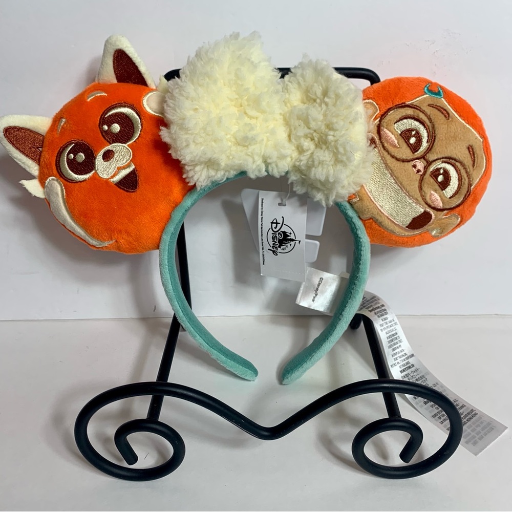 NWT. Turning Red ears. Minnie transforms the typical mouse ear headband